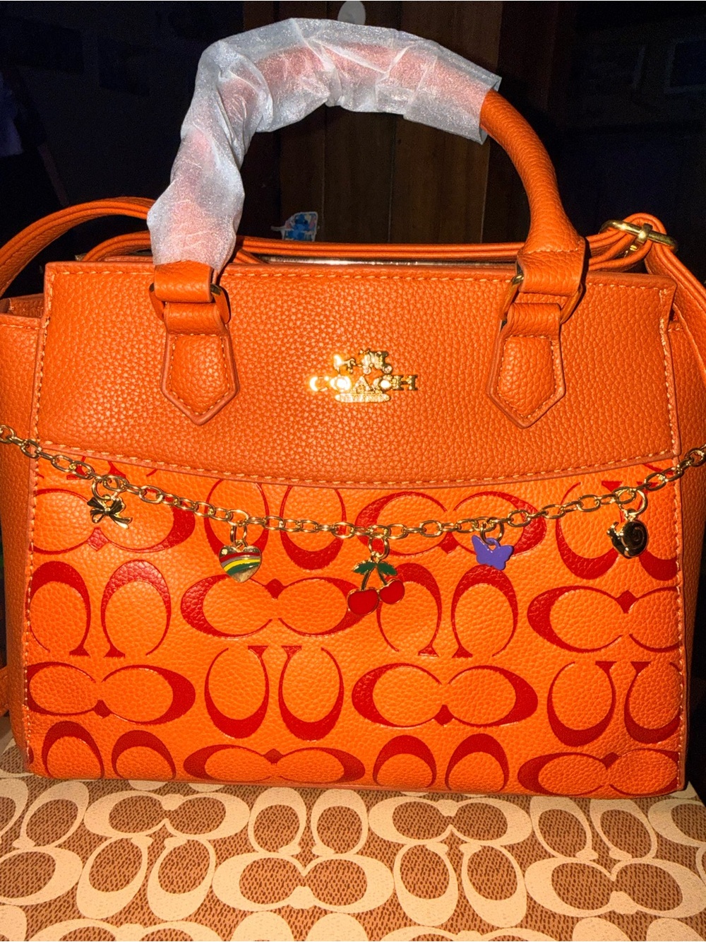 Coach Orange Signature Leather Satchel with Gold Charm Chain